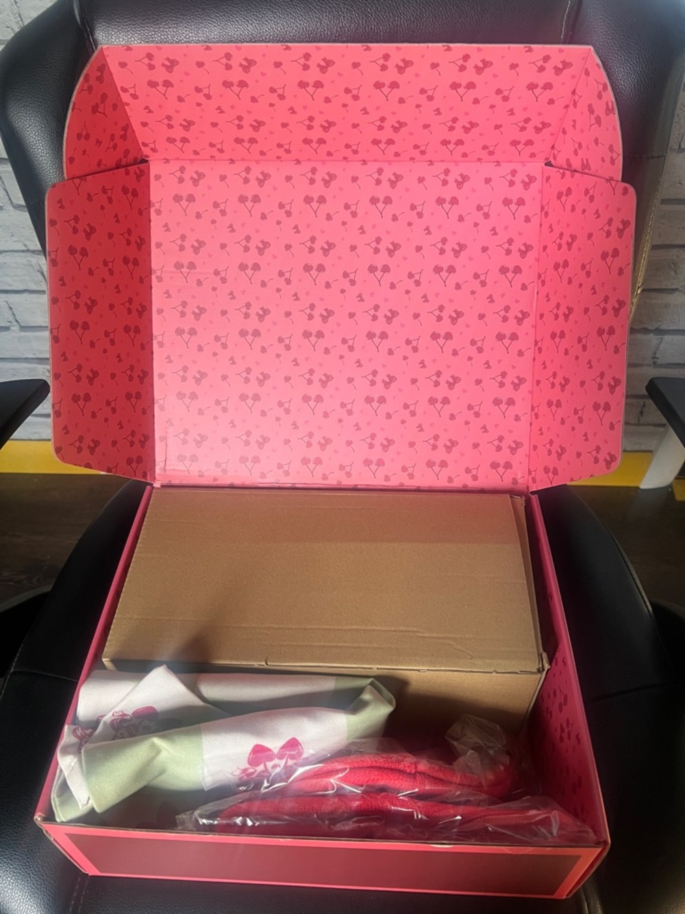 Cherry box containing 40 ounce Tumblr, a hat and a tote bag